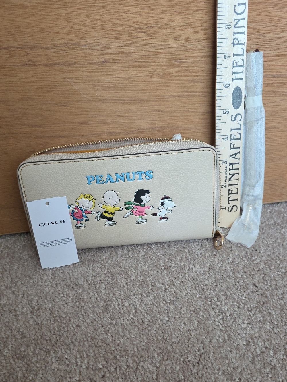 Coach Beige Peanuts Zip Around Wallet with Blue Logo